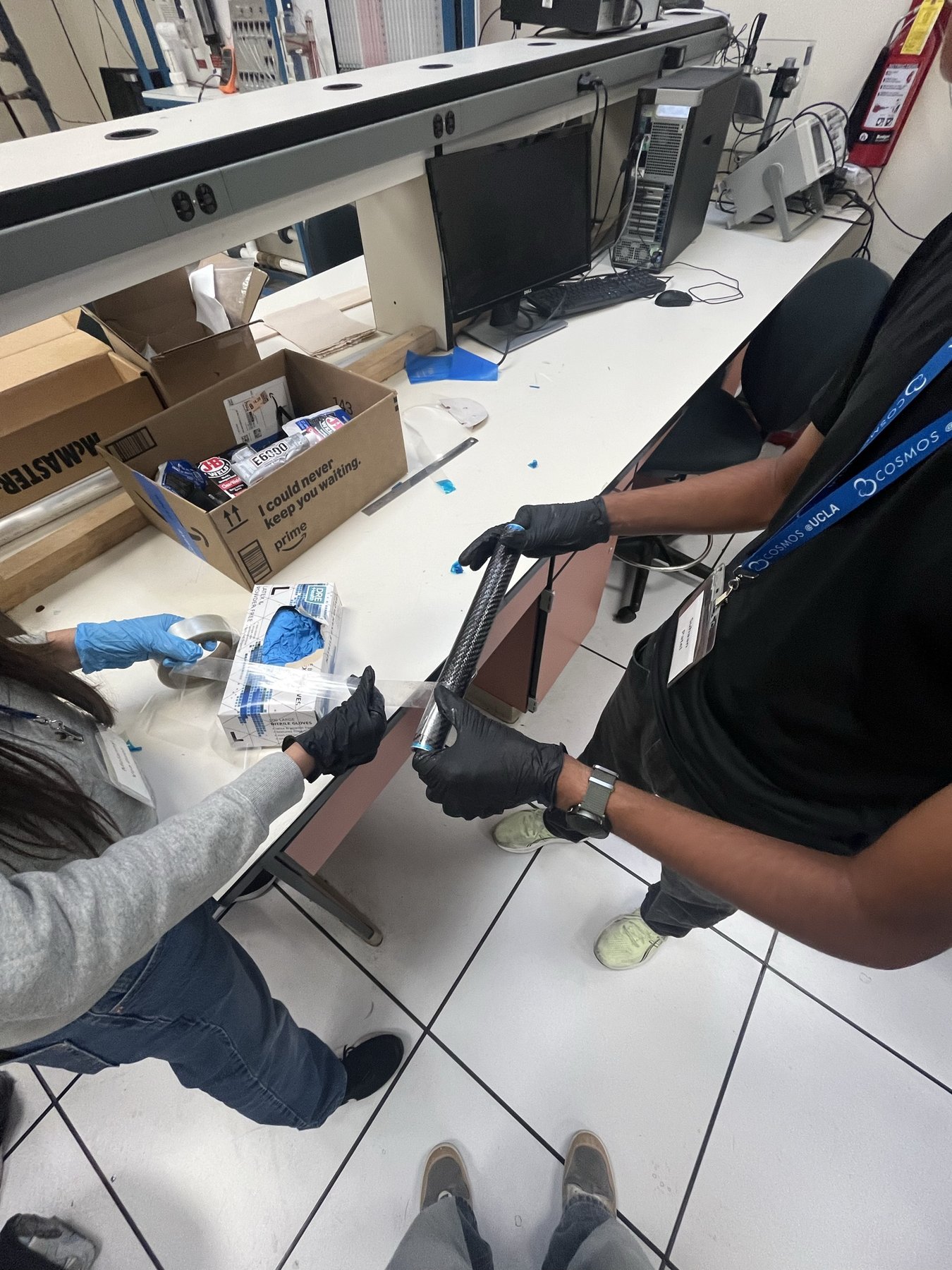 Wrapping carbon fiber around the mandrel