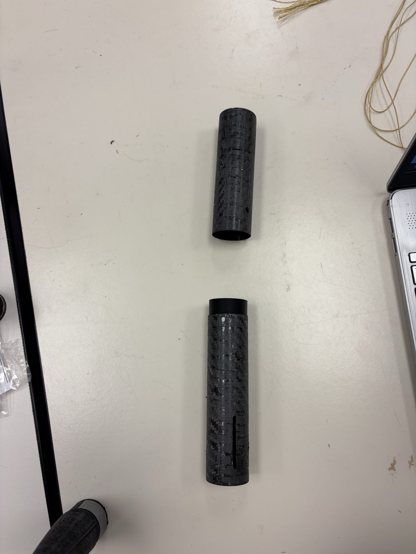 Upper and lower carbon fiber body tubes